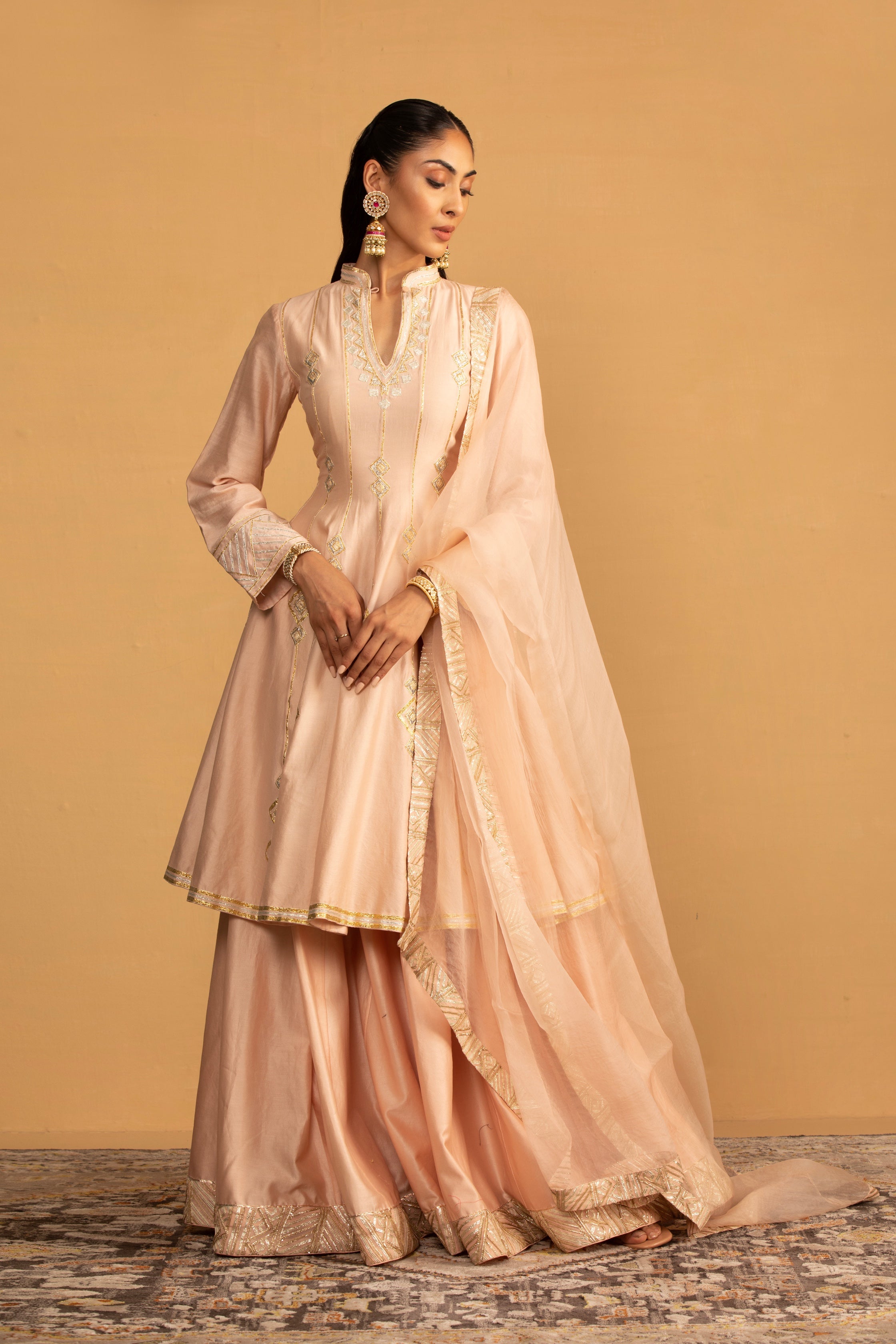 Raisa – peach organza lehenga, bisouNYC
