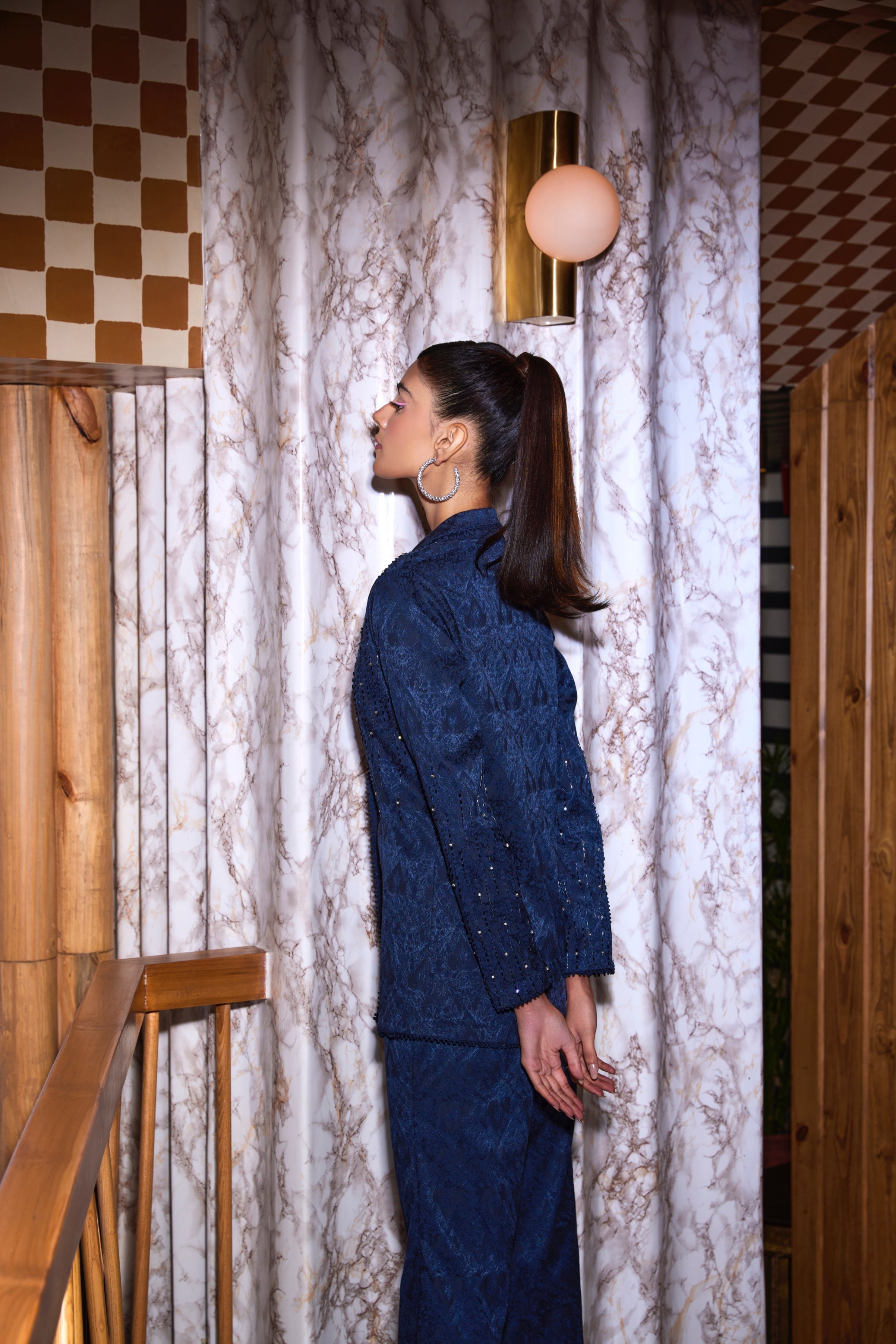 Seema – navy suit, bisouNYC