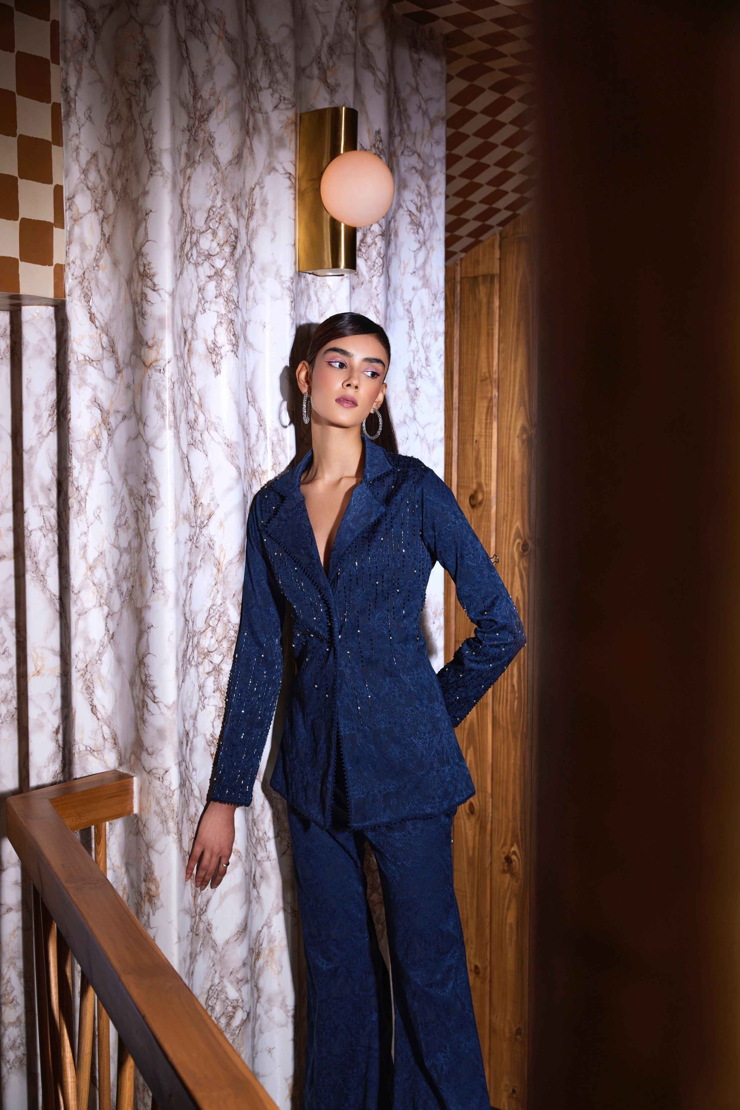 Seema – navy suit, bisouNYC
