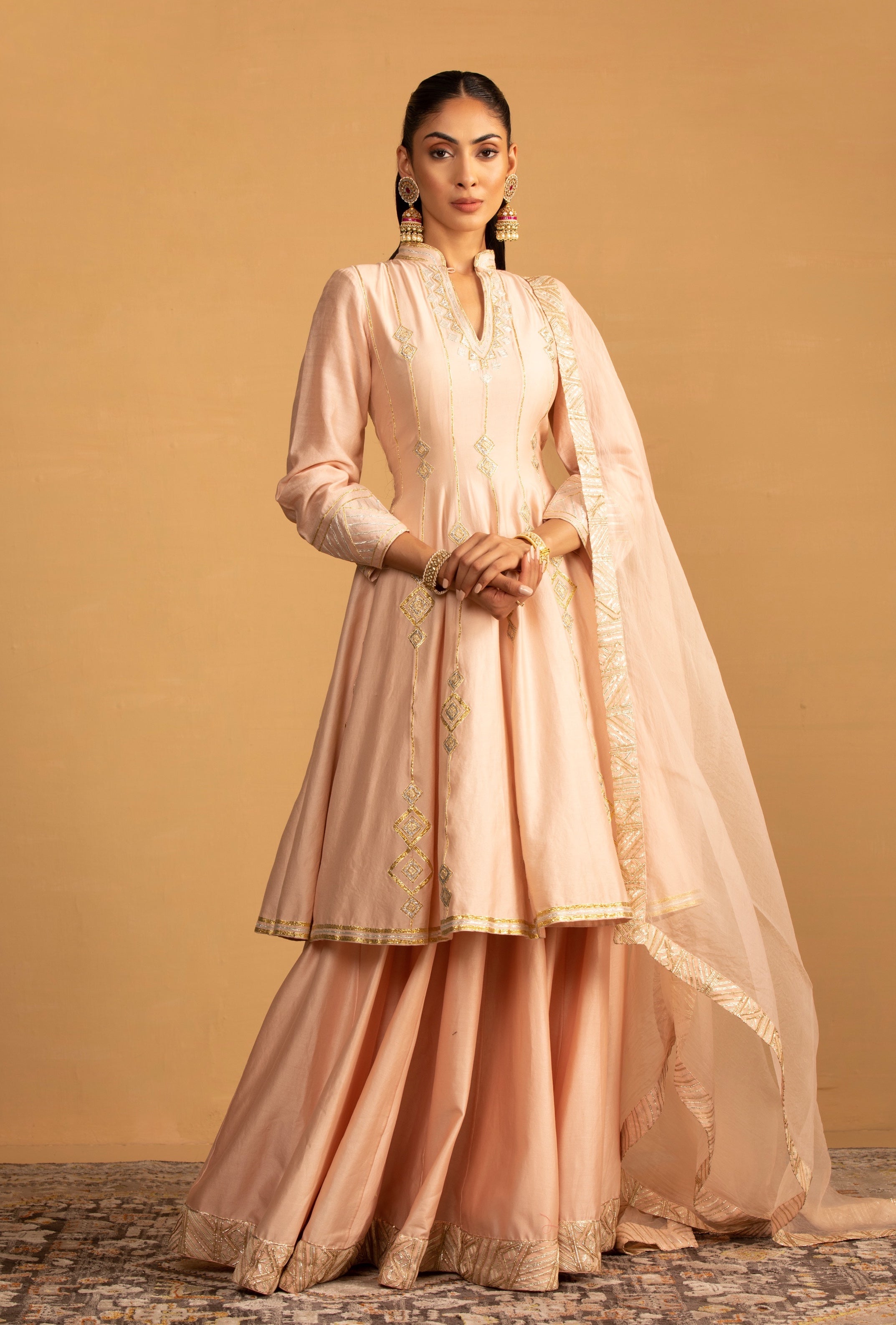 Raisa – peach organza lehenga, bisouNYC