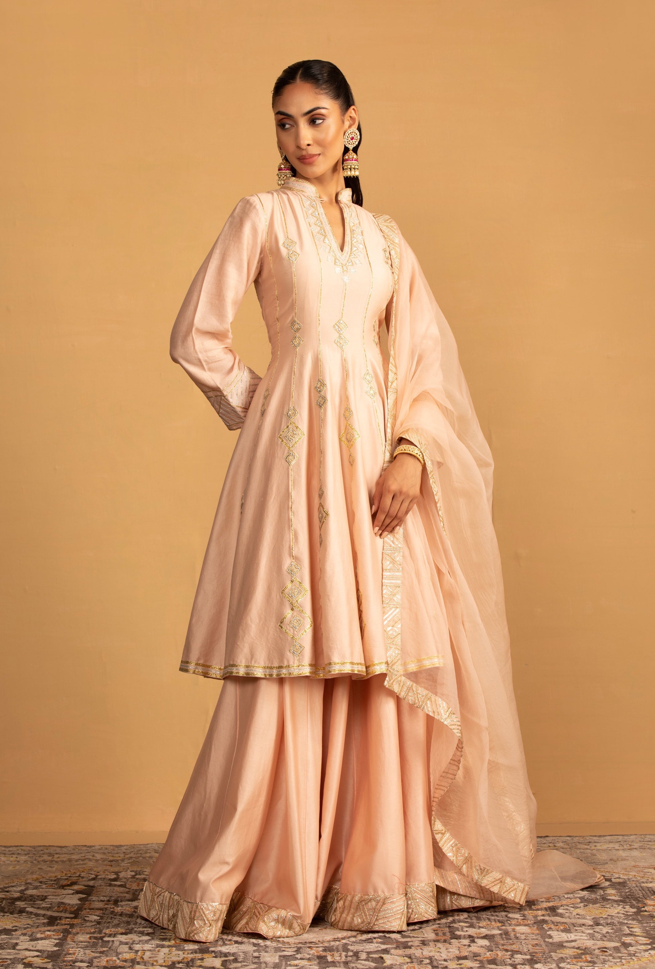 Raisa – peach organza lehenga, bisouNYC