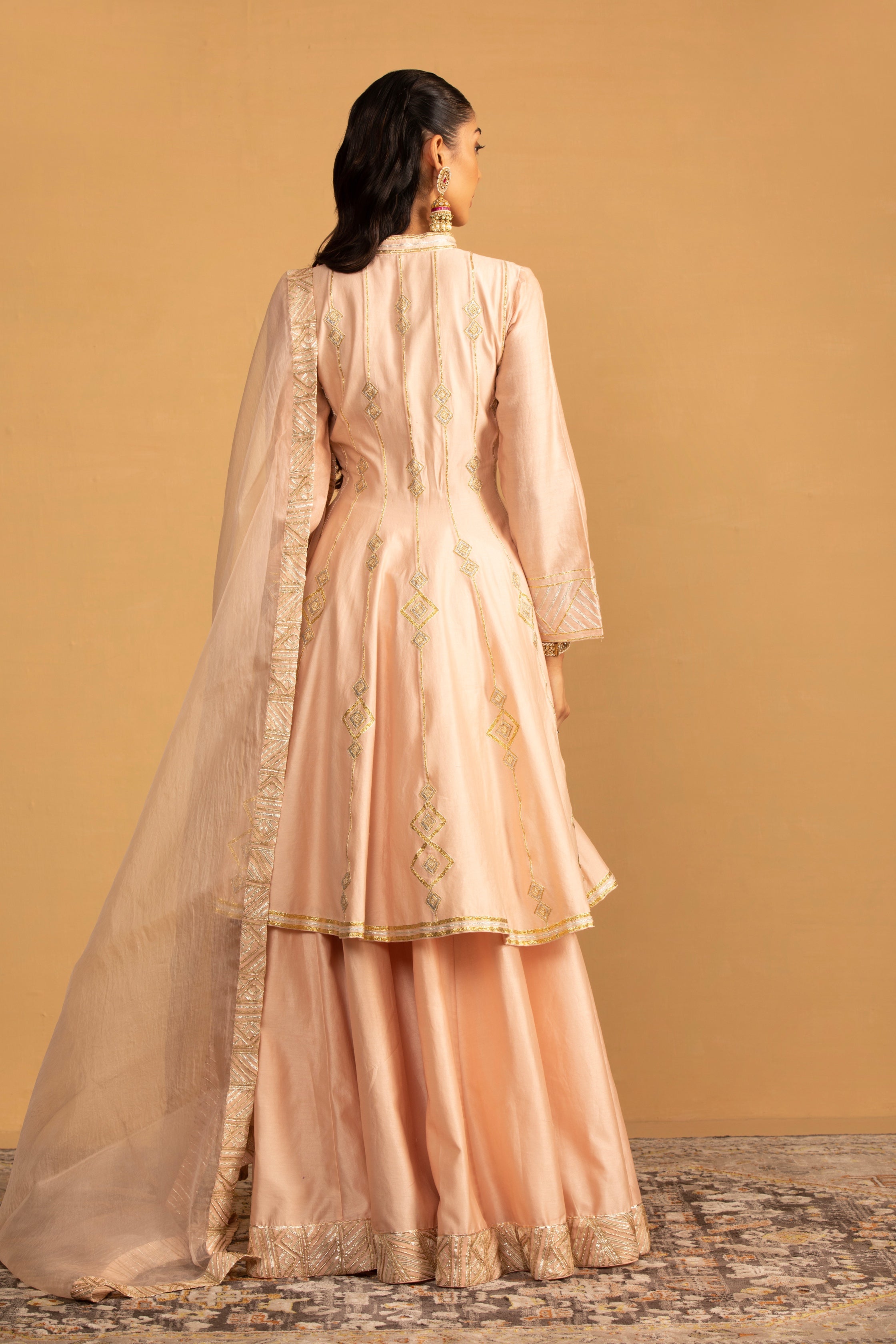 Raisa – peach organza lehenga, bisouNYC